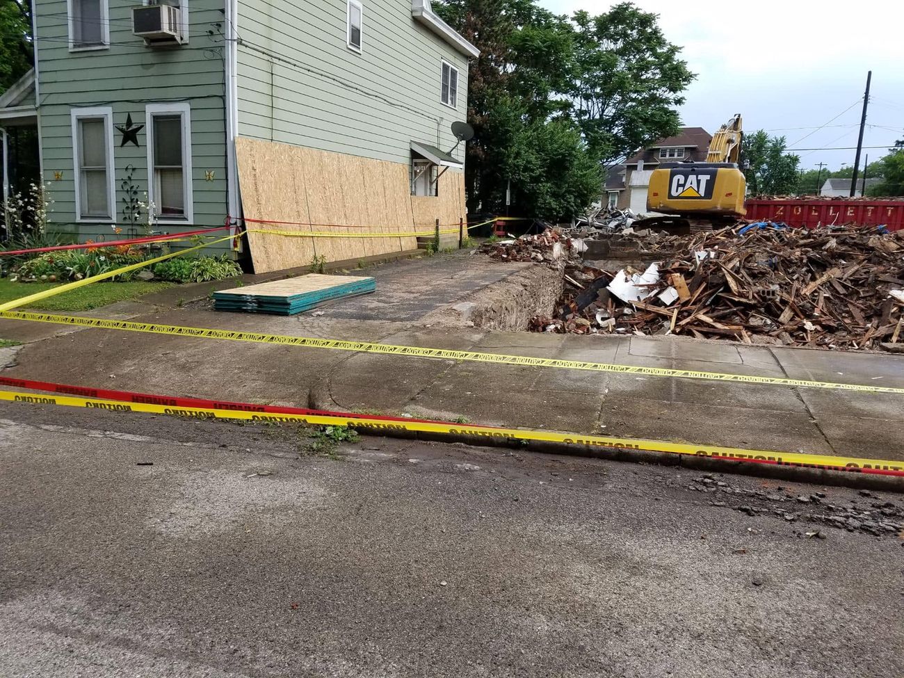 Demolition debris stacked ready to be hauled away