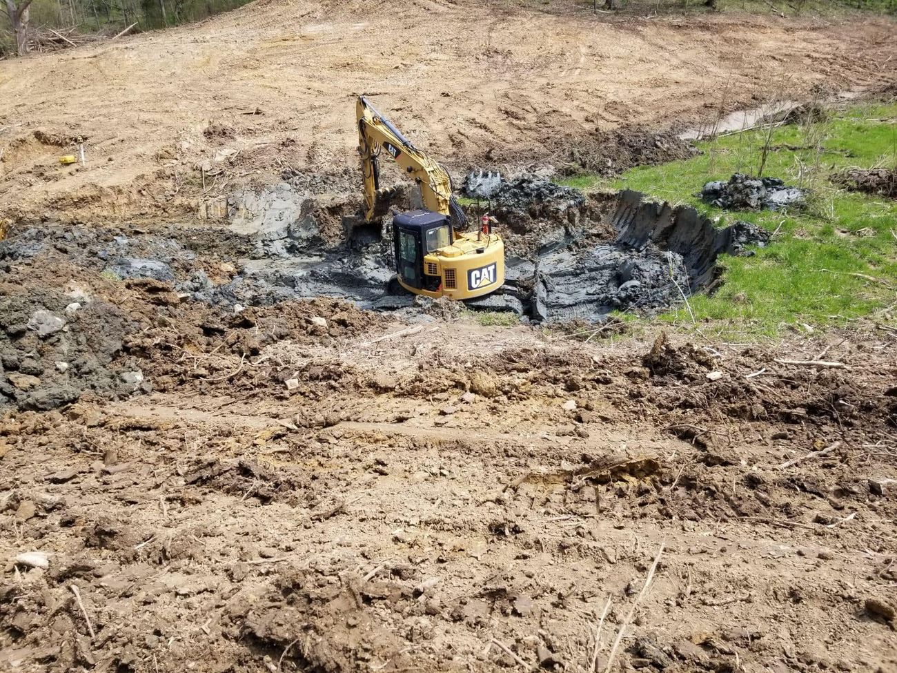 A newly dug pond starting to hold water