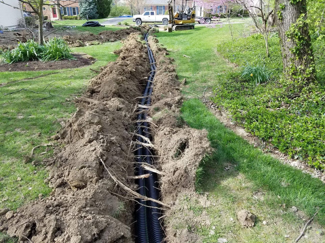 Drain line laid into a freshly cut trench